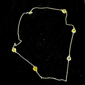 Gold tone 17” necklace with gold bezeled “stone accents.